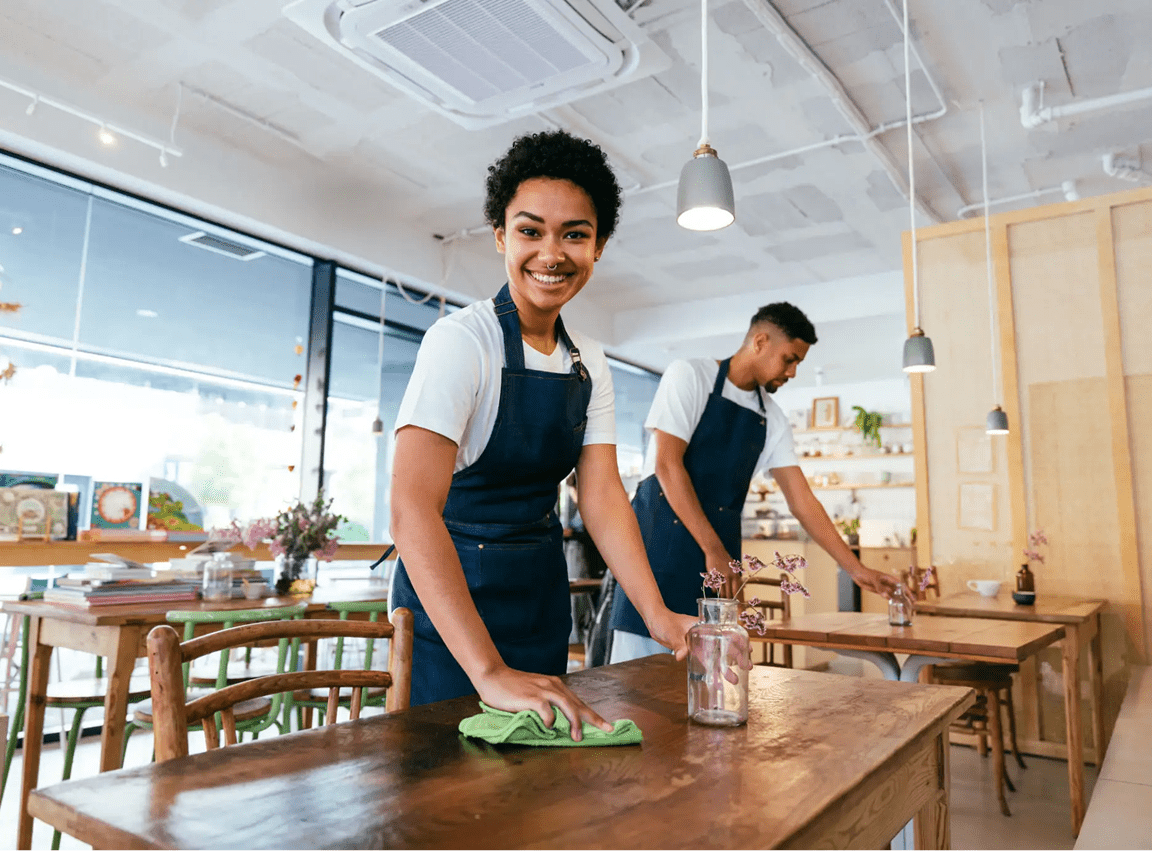 Friendly servers maintaining a clean cafe